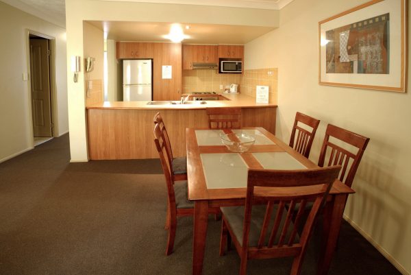 6 guest settings in our 2 bedroom apartments with full  kitchens